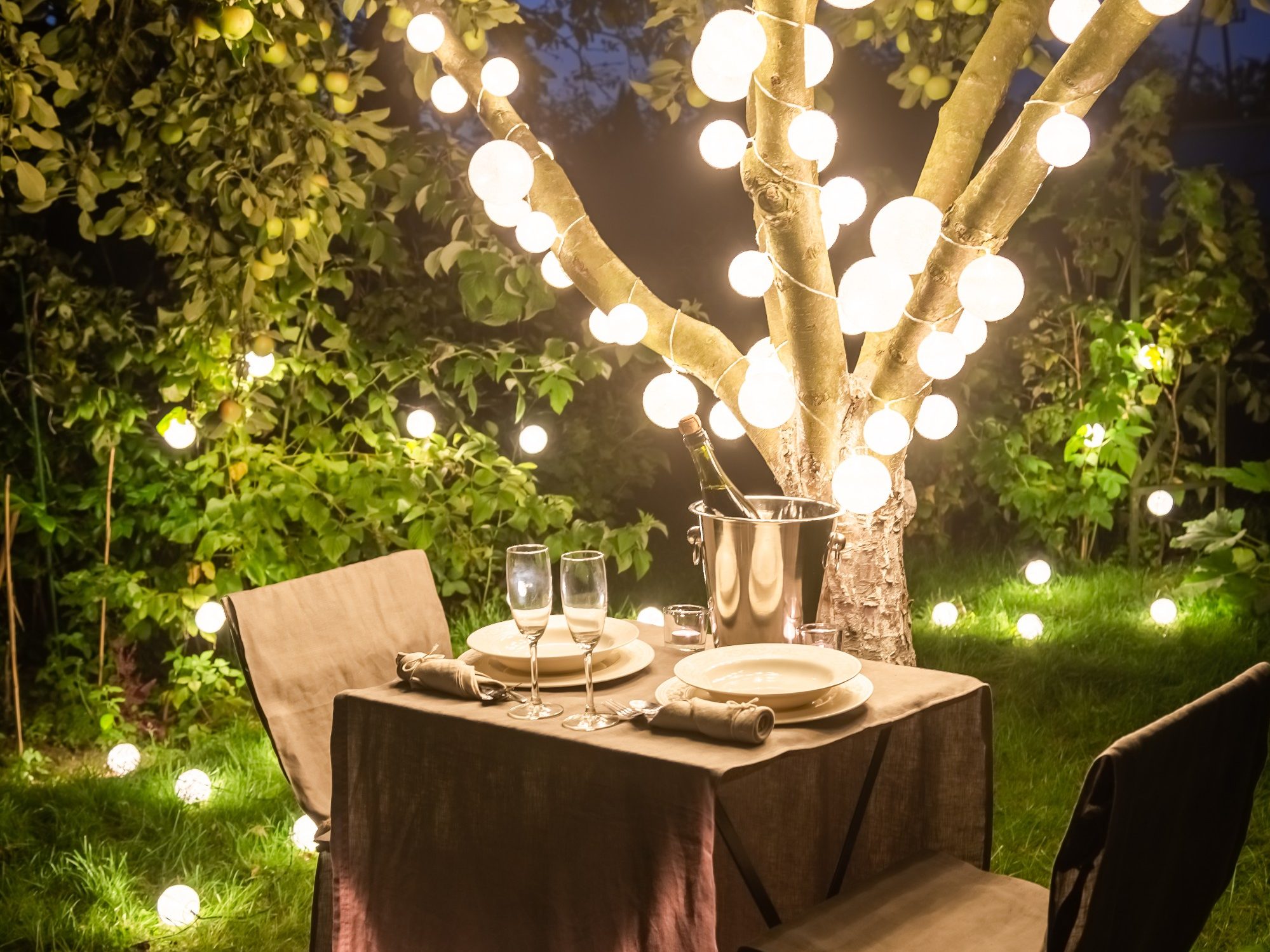 Table for two for perfect date in evening garden