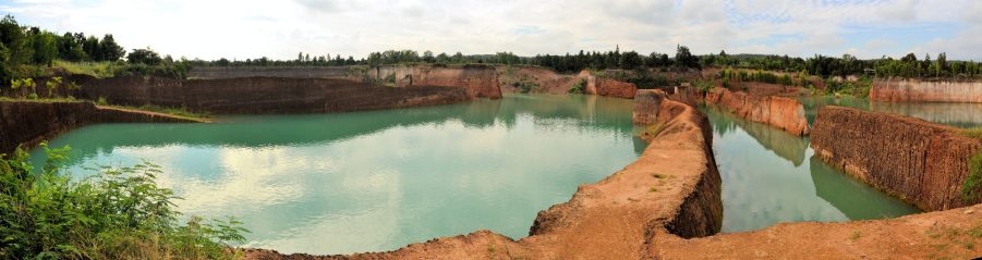 popular quarry pond for swimming and outdoor life, lake at excavation site in Opkhan national park near Chiang Mai, Thailand