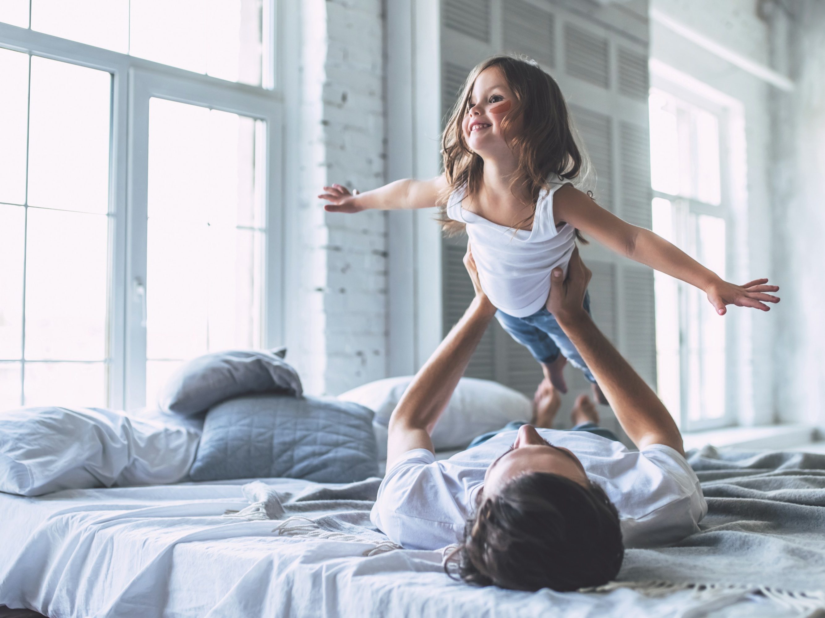Dad with daughter at home